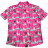 Pink shirt with llama and cactus pattern on a white background. A nod To Phish's song Llama.