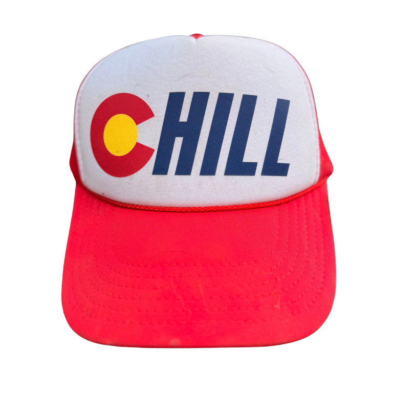 A red and white trucker hat featuring the word 'CHILL' in blue with a red and yellow Colorado 'C' logo on the front panel.
